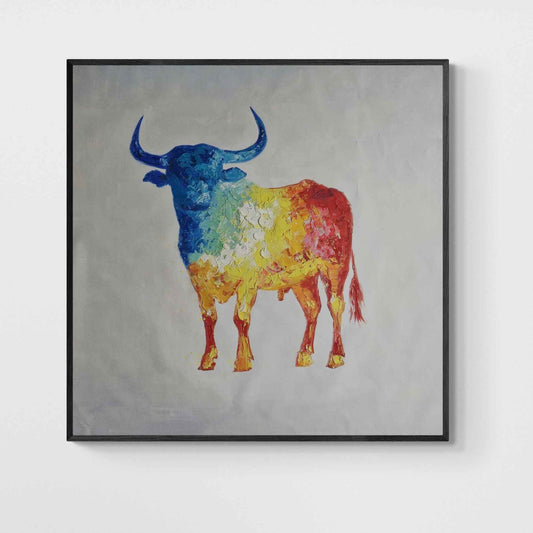 Cuadro al óleo pintado a mano con la imagen de un toro estilizado en tonos vibrantes de colores cálidos y fríos.